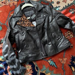 Black leather motorcycle jacket. Size S.BCBG Butter soft, leopard trim on flap.